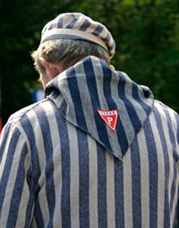 Former polish political prisoner of the Nazi concentration camp in the camping striped uniform